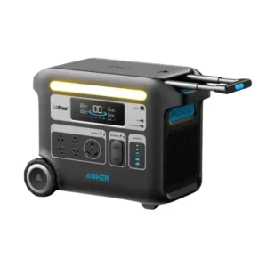 A studio product photo of the Anker SOLIX F2000 portable power station with its telescoping handle extended, showing its rugged matte-black body, integrated wheels, illuminated warm-white light bar, and multiple front-facing AC, DC, and USB-C output ports.