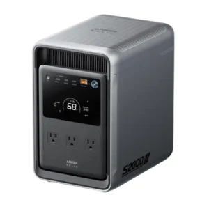 A studio product photo of the compact Anker SOLIX S2000 portable power station against a white background, showing its vertical dark gray chassis, silver-gray metallic trim, front LCD display showing 68% battery capacity, three AC outlets, USB ports, and the S2000 designation on the side.