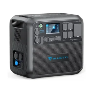 A front-and-side studio photo of the BLUETTI AC200MAX portable power station on a white background, featuring a dark grey casing, touchscreen display showing 50% battery capacity, dual wireless charging pads, side expansion ports, and multiple covered AC, DC, and USB outputs.