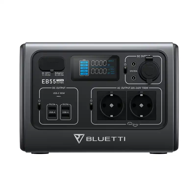 A symmetrical front-facing studio product photo of the BLUETTI EB55 portable power station on a white background, displaying its compact dark grey body, centered LCD display, two Schuko AC outlets, and various DC and USB ports.