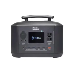 A symmetrical front-facing studio product photo of the BigBlue Cellpowa 500 portable power station on a white background, showing its compact charcoal-grey body, integrated top handle, central LCD screen, two AC outlets, DC outputs, USB ports, and red power button