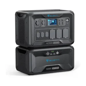 A studio product photo of the stacked BLUETTI AC500 + B300S modular power system, showing the 5,000W inverter on top of the 3,072Wh LiFePO4 expansion battery against a clean white background.