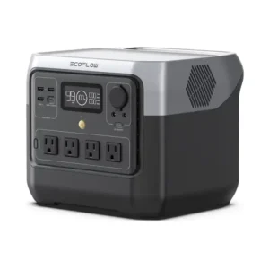 A studio product photo of the EcoFlow RIVER 2 Pro portable power station on a white background, featuring its silver-and-black two-tone design, integrated carry handle, front LCD display, four AC outlets, multiple USB and DC ports, and a hexagonal side ventilation grille.