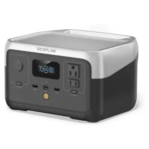 A studio product photo of the compact EcoFlow RIVER 2 portable power station against a white background, displaying its silver-and-black two-tone chassis, front LCD display showing 100% battery, standard AC outlets, and USB ports.