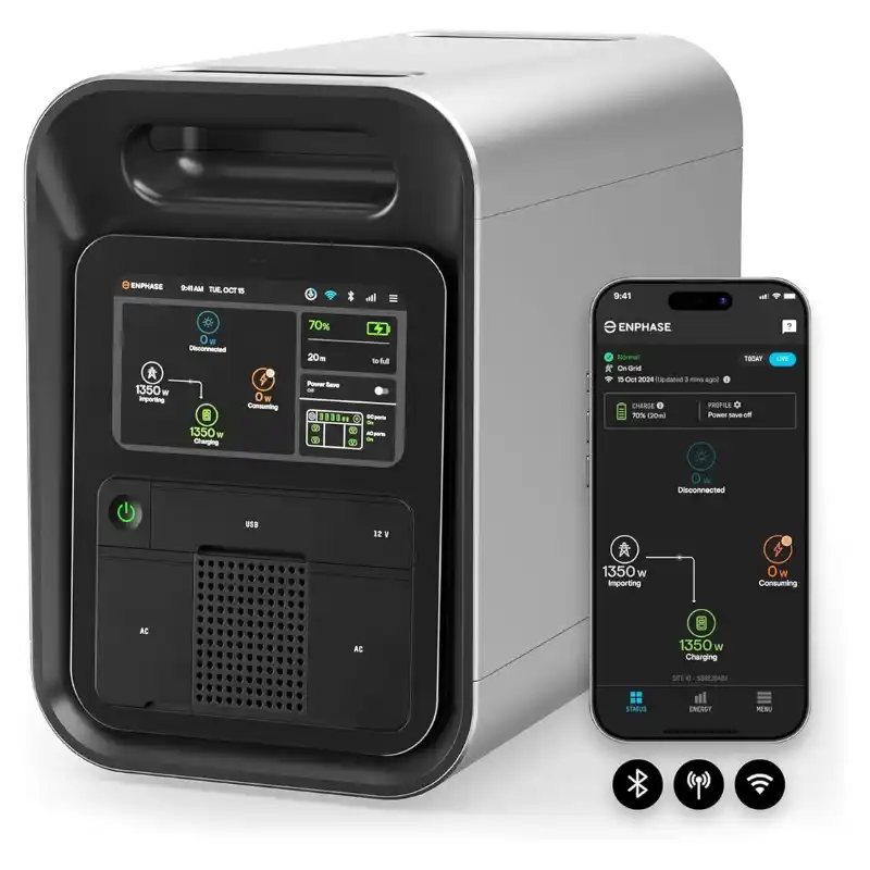 Enphase IQ PowerPack 1500 portable power station with its touchscreen display illuminated, positioned beside a smartphone displaying the Enphase App with real-time power data, on a plain white background.
