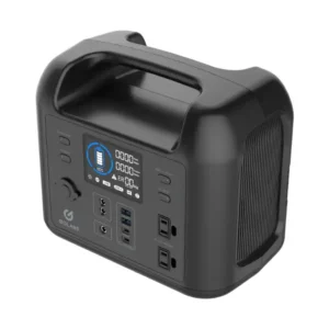 A front and side angled studio product photo of the GOLABS R500 portable power station on a white background, showing its compact matte-black body, integrated top handle, central LCD display, dual AC outlets, DC outputs, and USB ports.