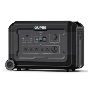 A studio product photo of the rugged OUPES Mega 3 portable power station on a white background, featuring a dark charcoal gray body, integrated transport wheels, a central digital display, and multiple front-facing AC, DC, and USB outputs.