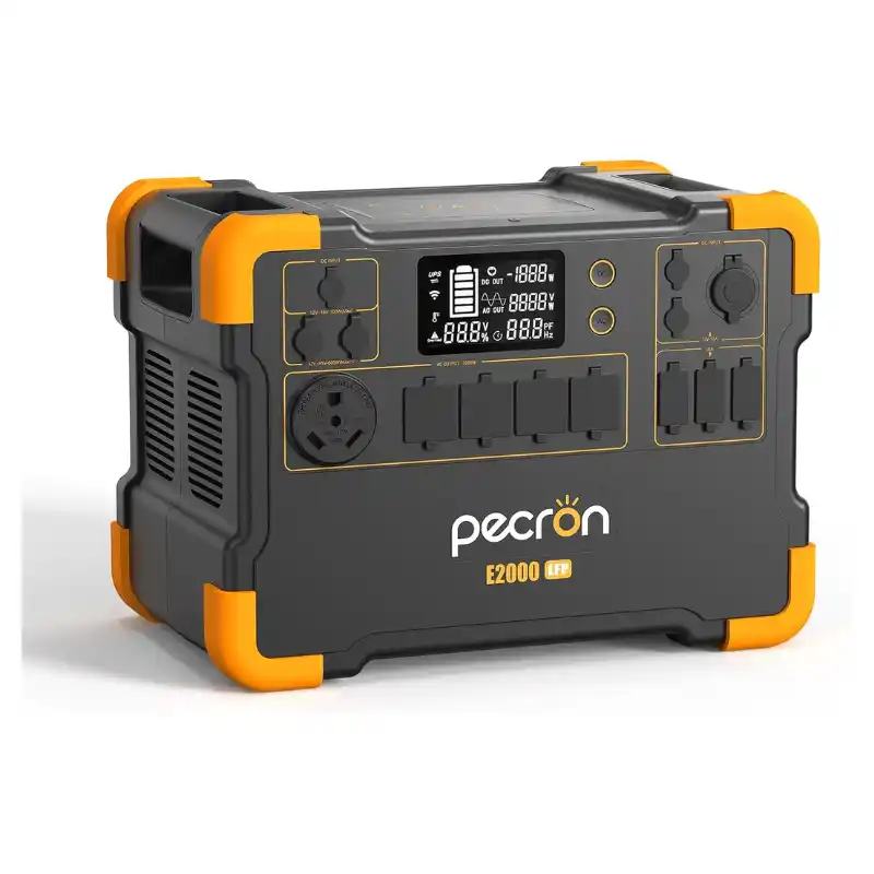 A front-angled studio photo of the Pecron E2000 LFP portable power station on a white background, featuring a dark grey chassis, bright orange protective corner bumpers, central digital display, four covered AC outlets, a 30A NEMA TT-30 RV outlet, and multiple DC and USB ports.